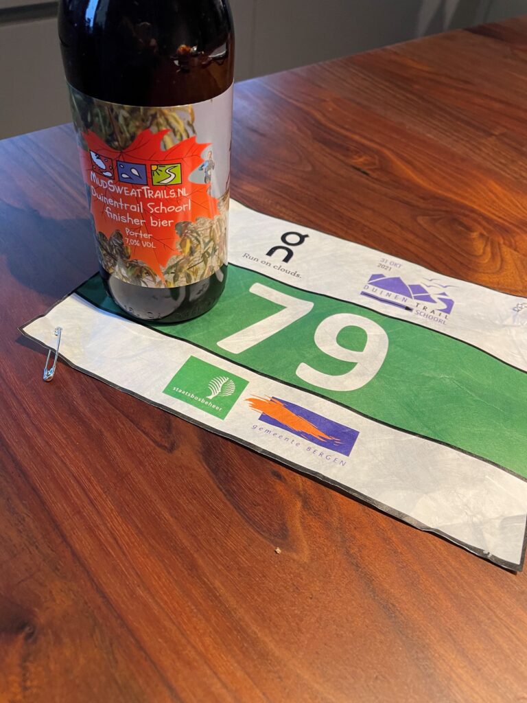 Finisher bier en startnummer